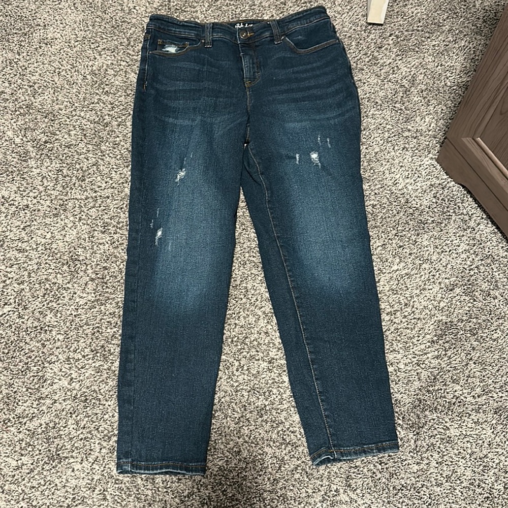 Lightly distressed denim jeans